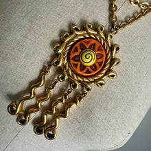 Charger l'image dans la galerie, Spectaculaire collier motif soleil en résine dorée et colorée signées TMB, circa 90s
