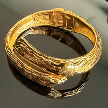 Load image into Gallery viewer, Pretty vintage hinged gilded metal bracelet signed YSL
