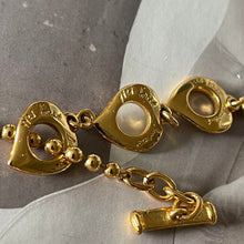 Charger l&#39;image dans la galerie, YSL, bel ensemble collier et boucles clips vintage croix en métal doré
