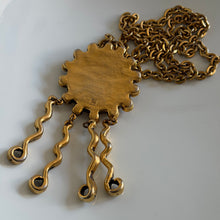 Charger l'image dans la galerie, Spectaculaire collier motif soleil en résine dorée et colorée signées TMB, circa 90s
