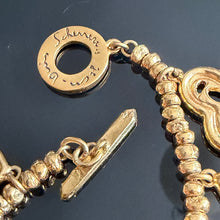 Charger l'image dans la galerie, Joli bracelet vintage couture en métal doré signé Jean-Louis Scherrer
