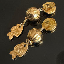 Load image into Gallery viewer, Long vintage-style dangling fish-pattern clip-on earrings in gold-tone metal with red rhinestones
