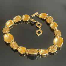 Charger l&#39;image dans la galerie, Sublime collier métal doré et cabochons de résine ambrée YSL par Goossens
