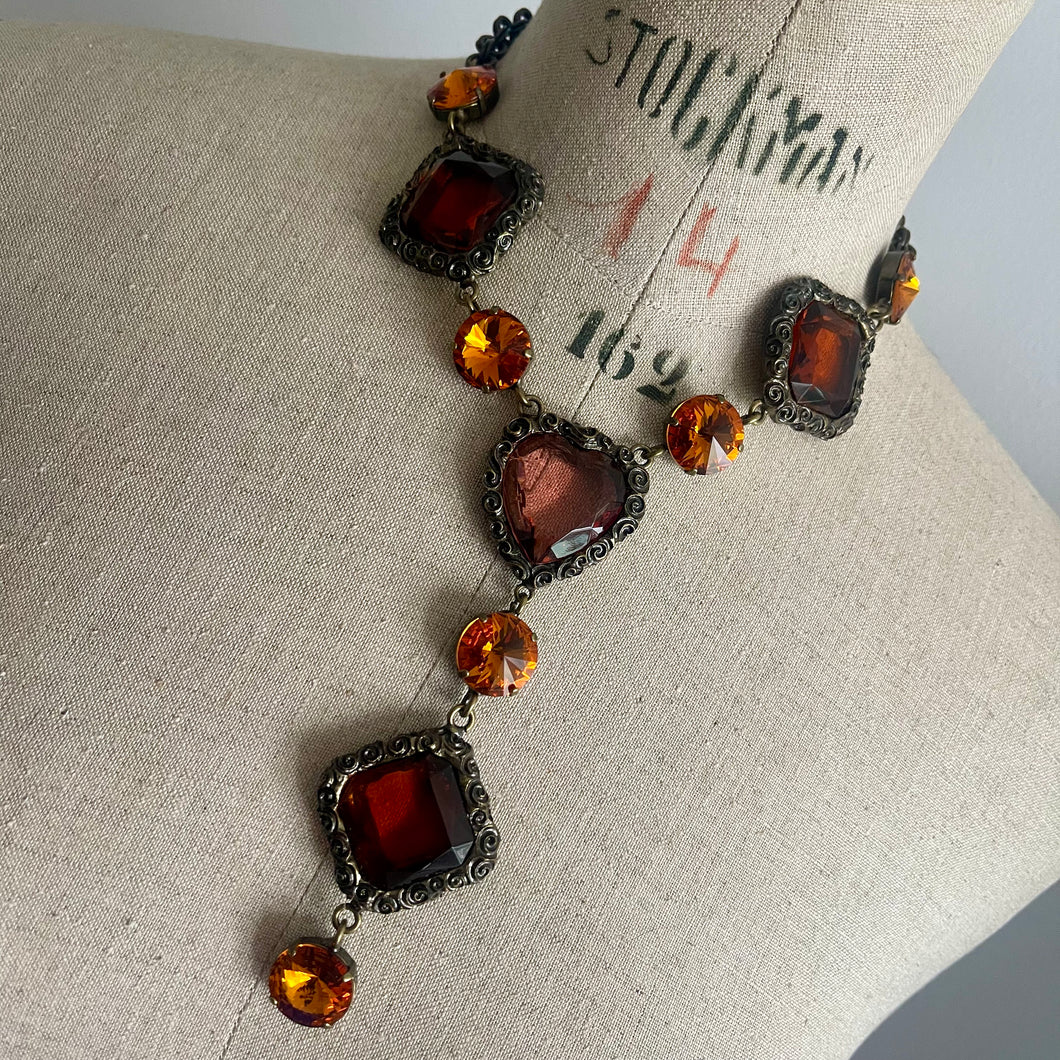 Très beau collier vintage en métal patine bronze et pierres colorées (cristal) signé Xavier Loubens