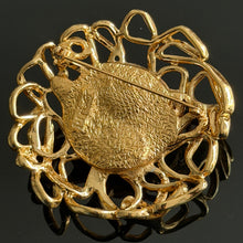 Load image into Gallery viewer, Beautiful large vintage couture brooch in gold-tone metal with a green resin cabochon, signed YSL
