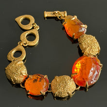 Charger l'image dans la galerie, Superbe bracelet vintage couture métal doré et résine orange signé YSL
