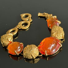 Charger l'image dans la galerie, Superbe bracelet vintage couture métal doré et résine orange signé YSL
