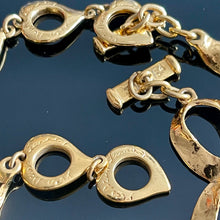 Charger l&#39;image dans la galerie, YSL, parure vintage en métal doré et résine ambrée motifs coeurs
