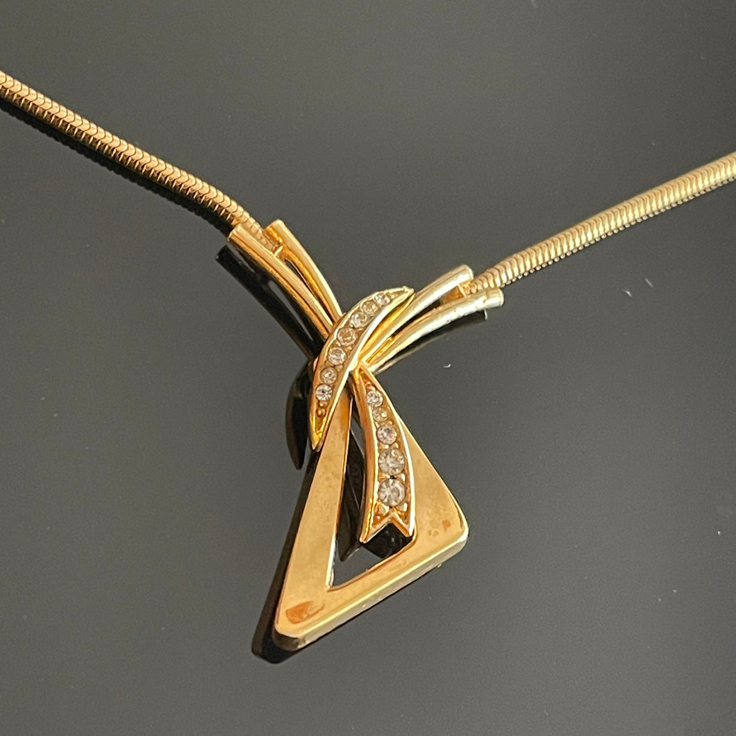 Carven, très joli collier pendentif vintage moderniste en métal doré et pierres blanches