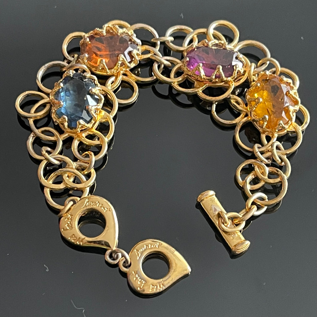YSL, joli bracelet vintage en métal doré et pierres de couleur