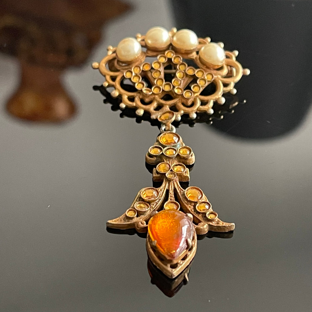 Henry, broche/ pendentif en métal doré avec perles, pierres jaunes et cabochon de verre