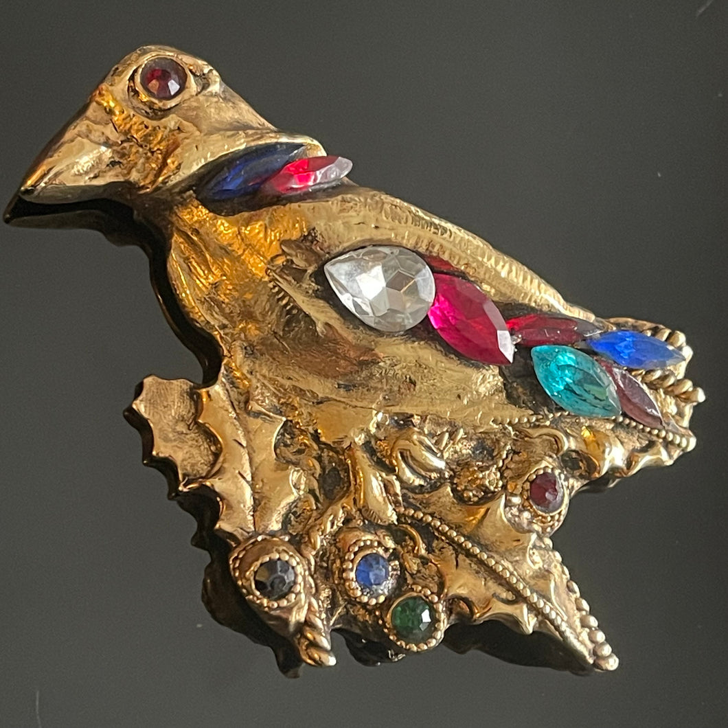 Kalinger, spectaculaire broche oiseau en résine dorée et pierres de couleur