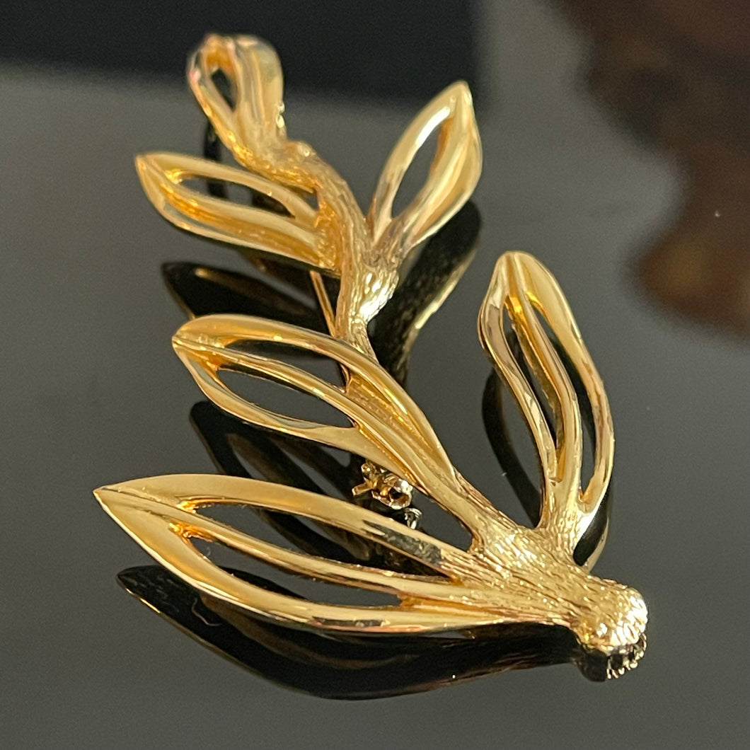 Dior, grande broche feuille vintage en métal doré