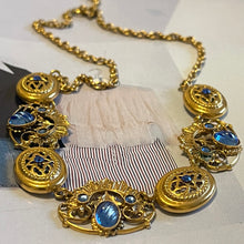 Charger l&#39;image dans la galerie, Henry, collier en métal doré et cabochons de verre bleus, années 50
